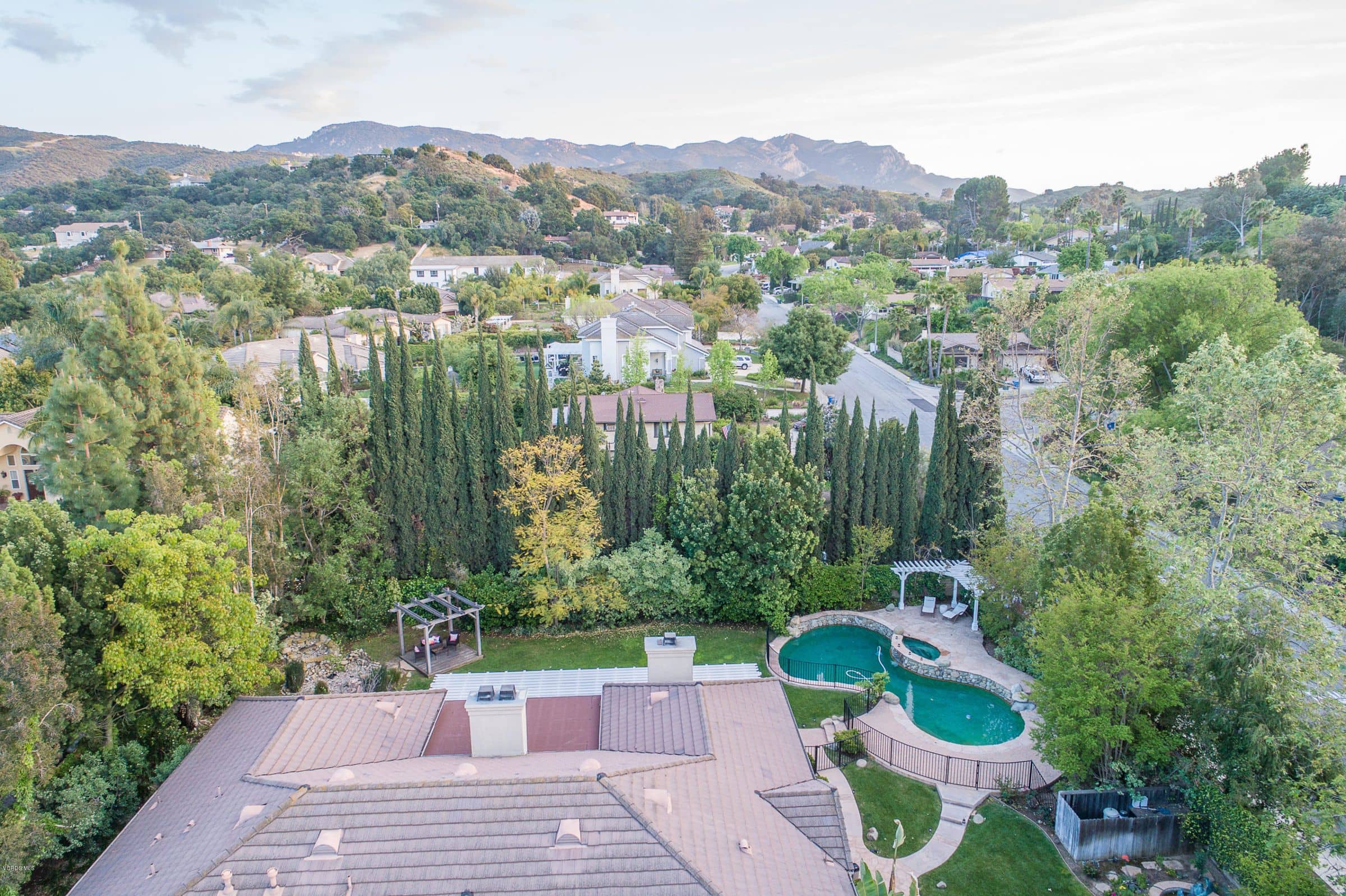 Drone view over Newbury Park toward the mountains, from one of Connie's listings