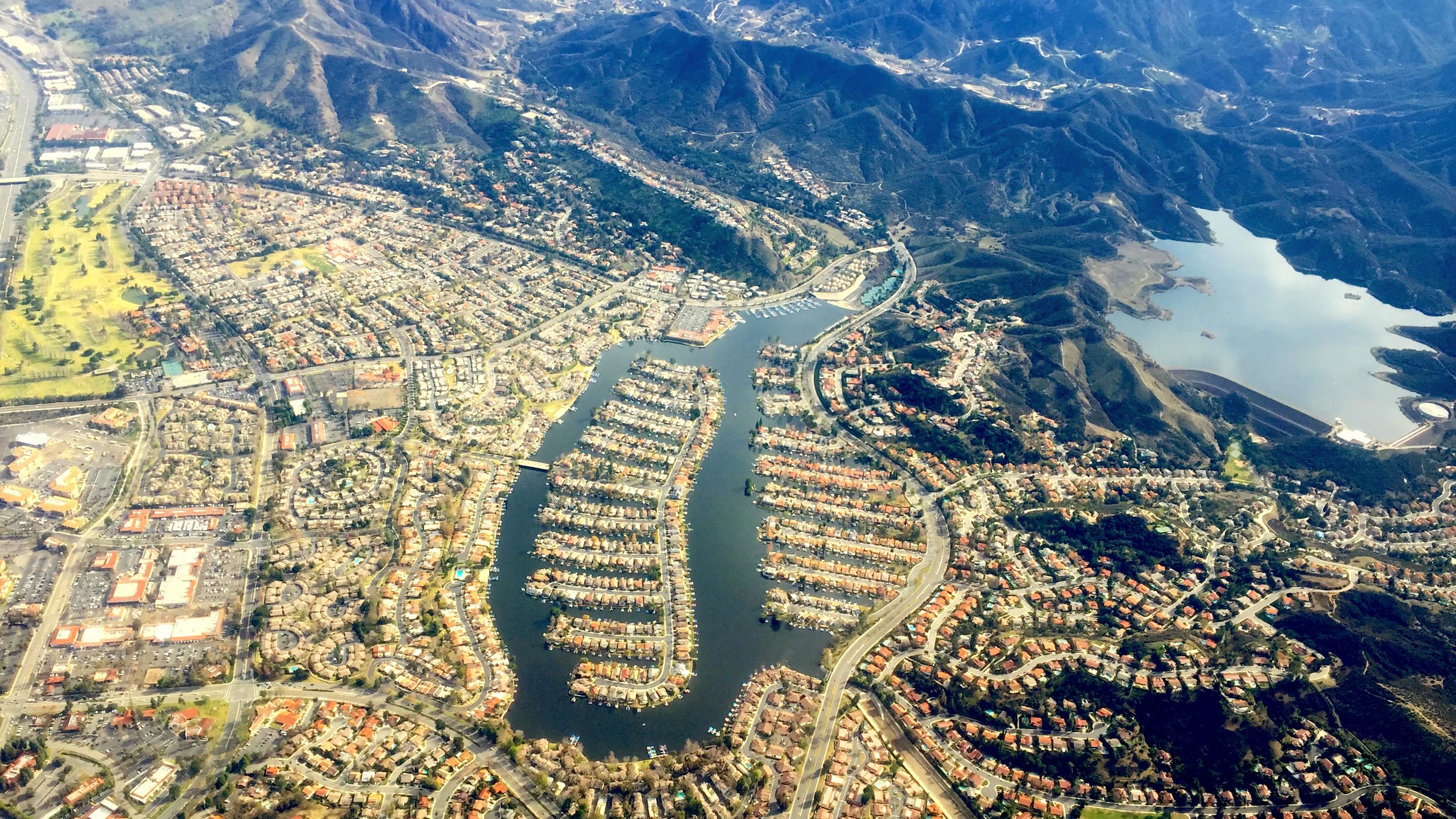 Aerial view of Westlake Lake, the Westlake Reservoir and the Santa Monica Mountains in late afternoon light